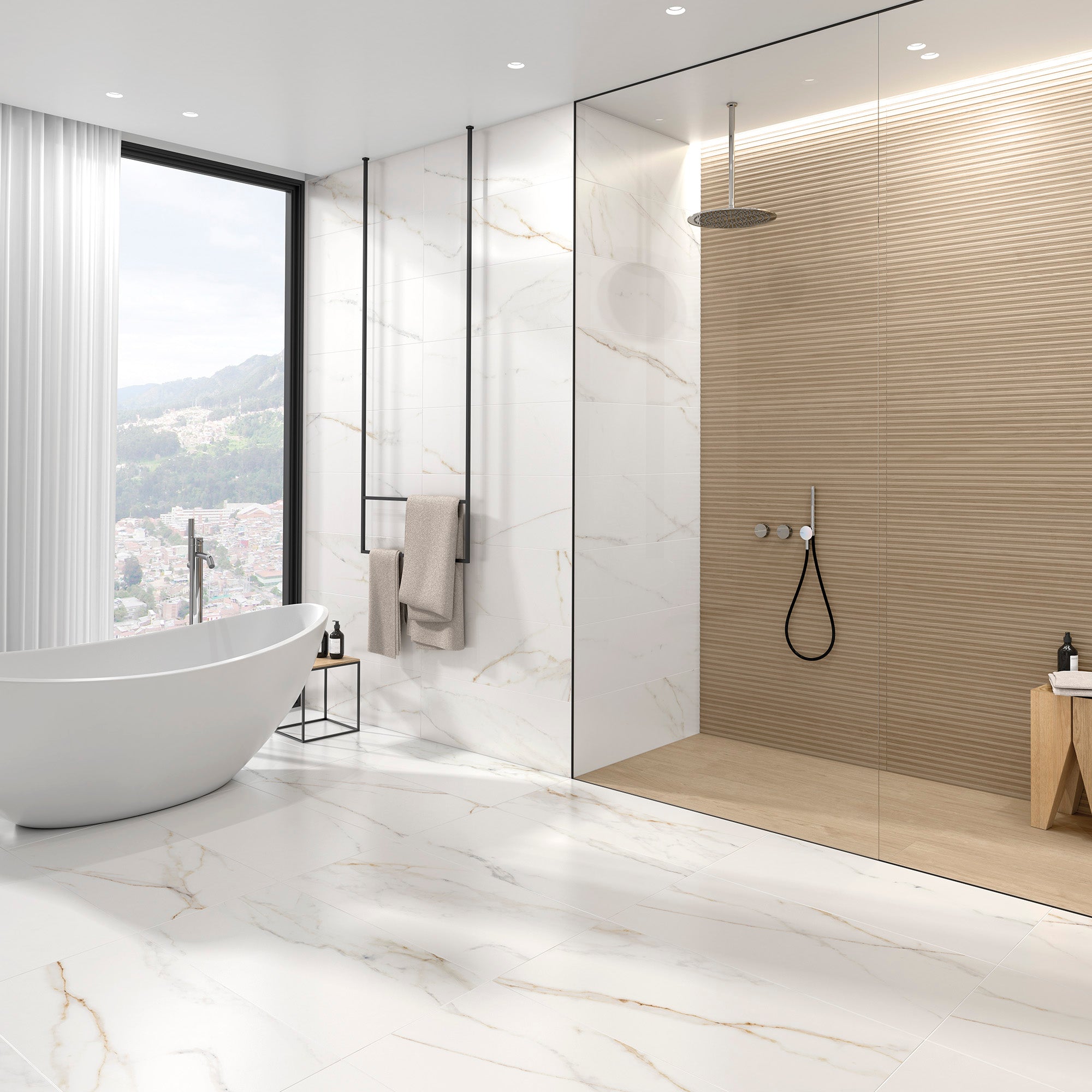 A modern washroom with bright white marble floors, and white tub. The shower has reeded vanilla wood look tiles for texture on the walls, and vanilla plank wood look tiles on the shower floor to match!  A modern washroom with bright white marble floors, and white tub. The shower has reeded vanilla wood look tiles for texture on the walls, and vanilla plank wood look tiles on the shower floor to match!