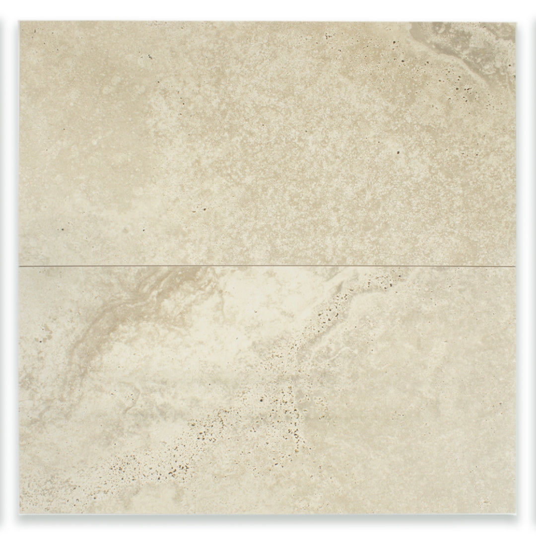 Ariel view of two large rectangular 12x24 tile that resembles travertine stone in light warm greige. 