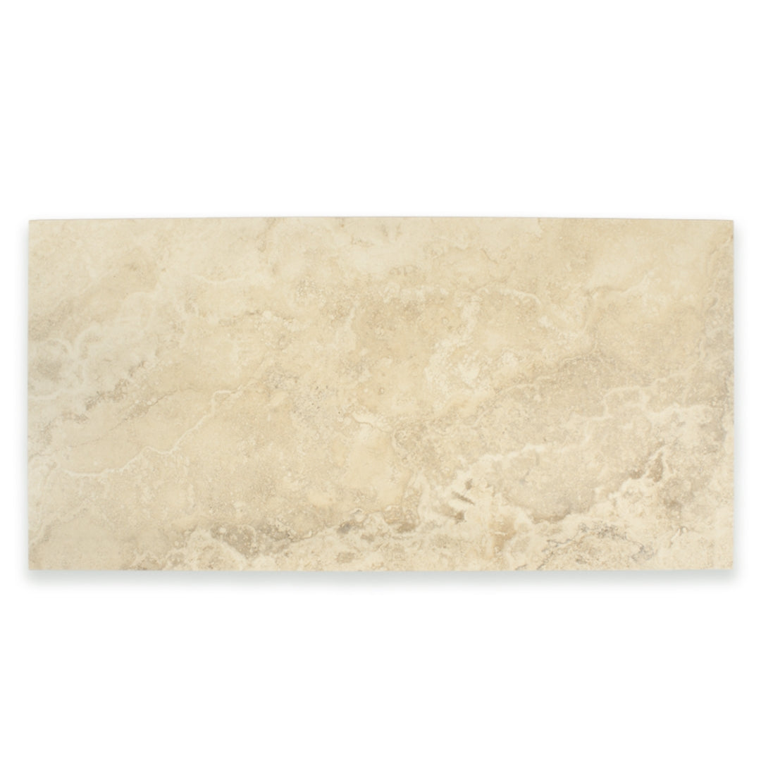 Ariel view of one large rectangular tile that resembles travertine stone in light warm beige. 