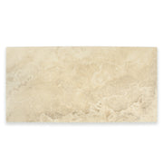 Ariel view of one large rectangular tile that resembles travertine stone in light warm beige. 