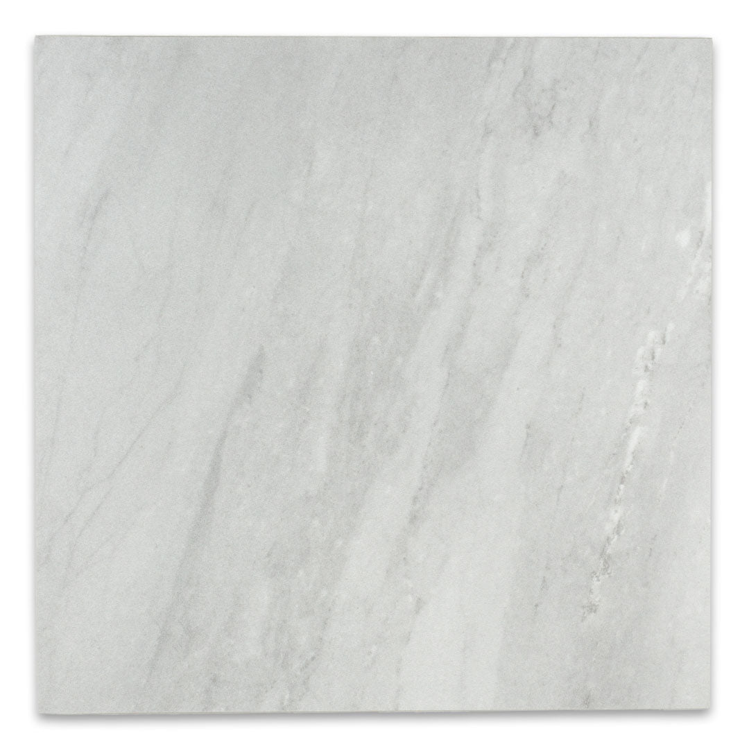 A single grey 12x12 maison luxury marble look tile with soft veining. 