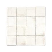 Ariel view of a group of 4x4 satin zellige tiles named plaster off white. they have a handmade look a subtle colour variation
