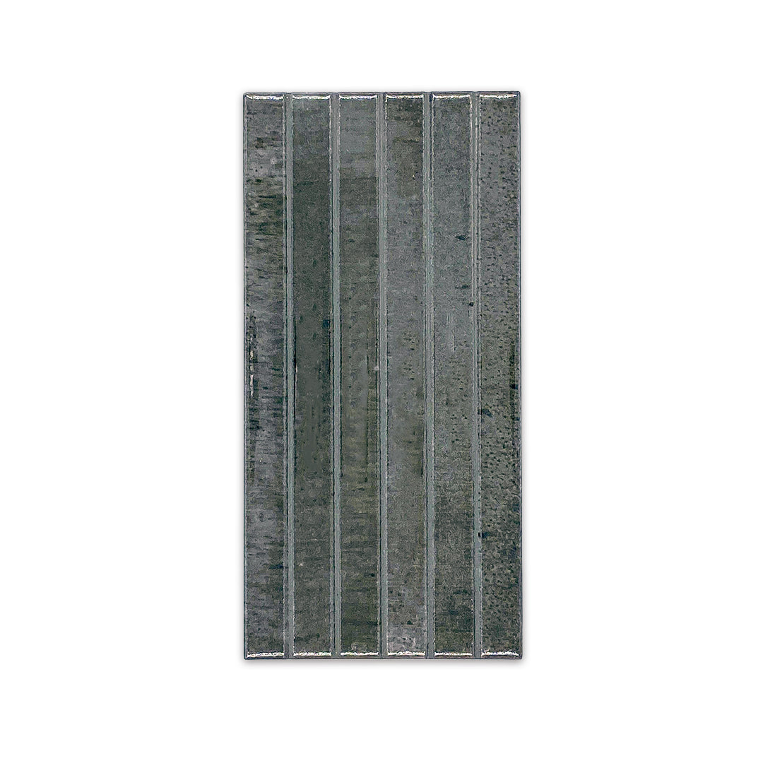 Ariel view of a single 5x10 panel tile in glossy black, the tile has a 3D linear faux grout line kitkat look. 