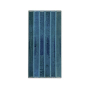 Ariel view of a single 5x10 panel tile in glossy navy blue, the tile has a 3D linear faux grout line kitkat look. 