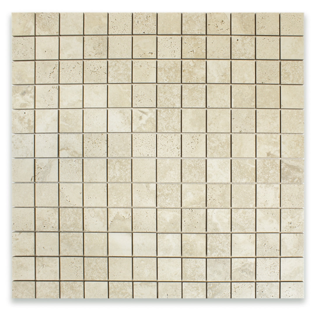 Ariel view of a 2x2 square mosaic tile that resembles travertine stone in griege. 
