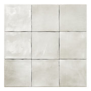 Ariel view of nine glossy 4x4 textured grey tiles showing the colour and texture. 