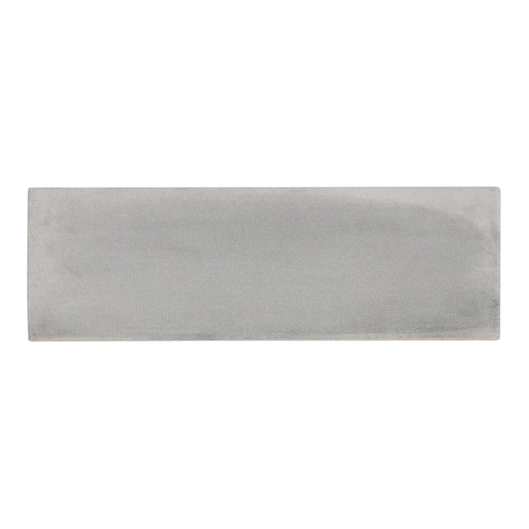 a single misty gray 2x6.5 matte bars subway tile 