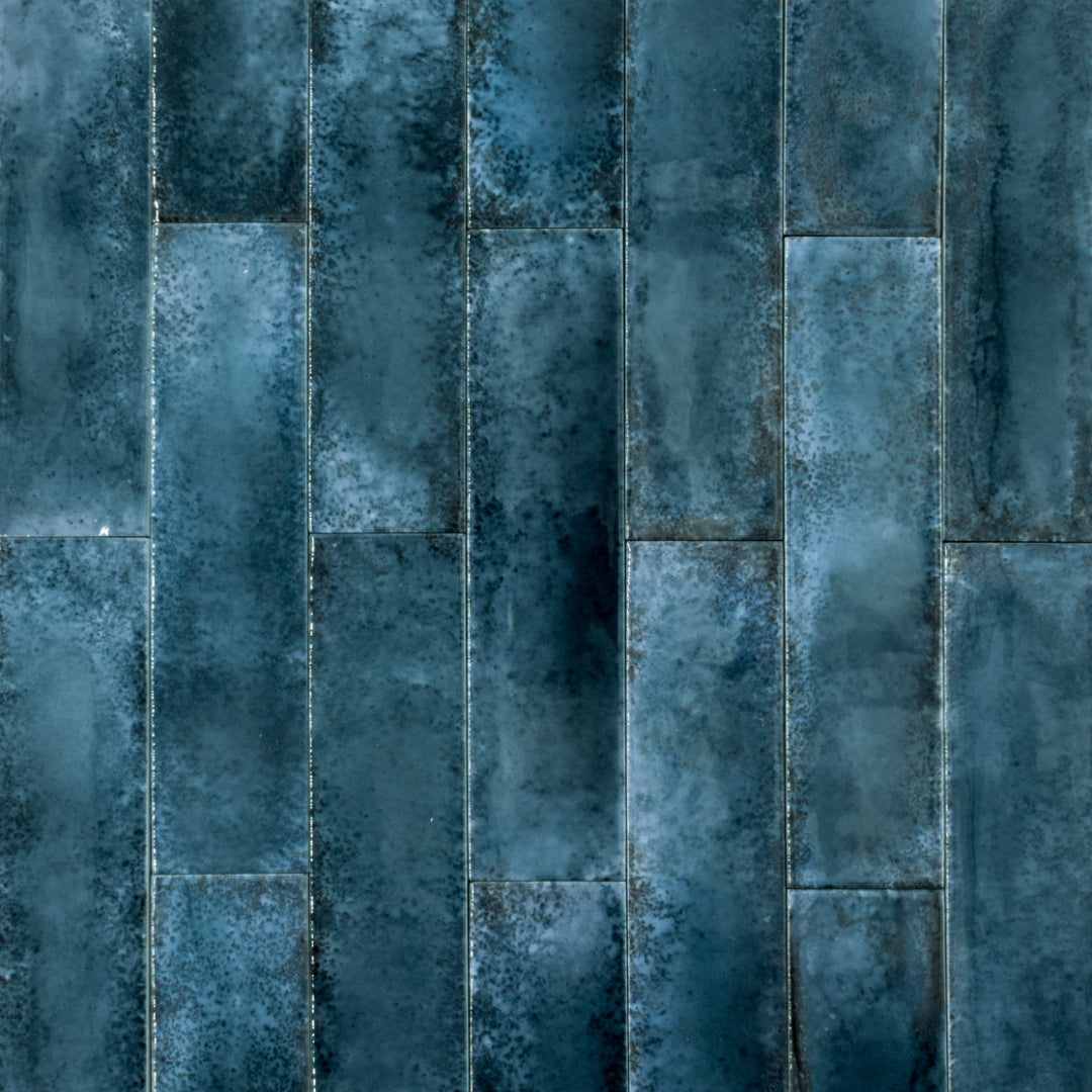 Ariel view of 2x9 ocean blue glossy tiles in a brick layout