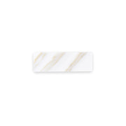 a single 2x6.5 natural marble stone calacatta gold matte subway tile