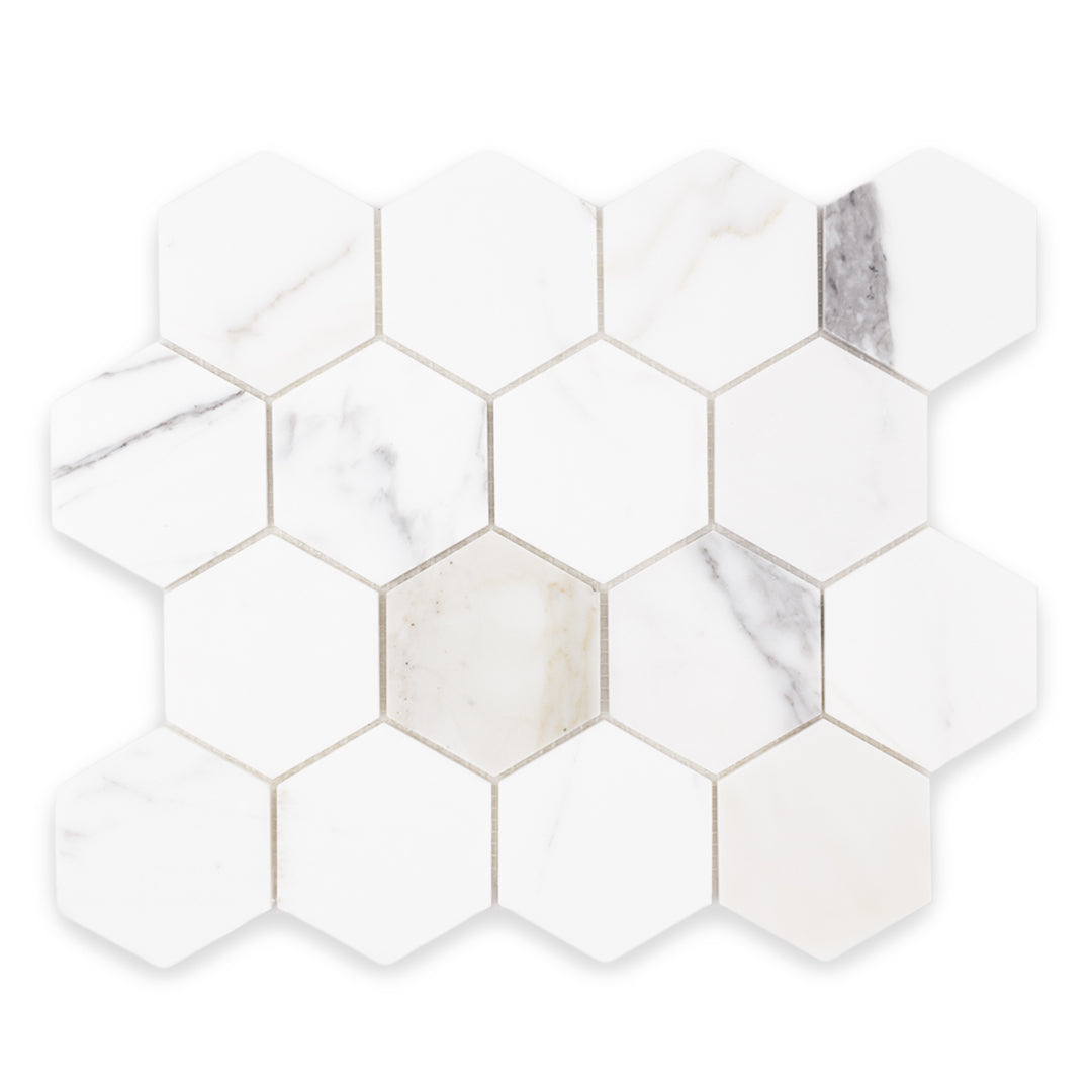 sample piece of a natural stone calacatta matte 3" hexagon