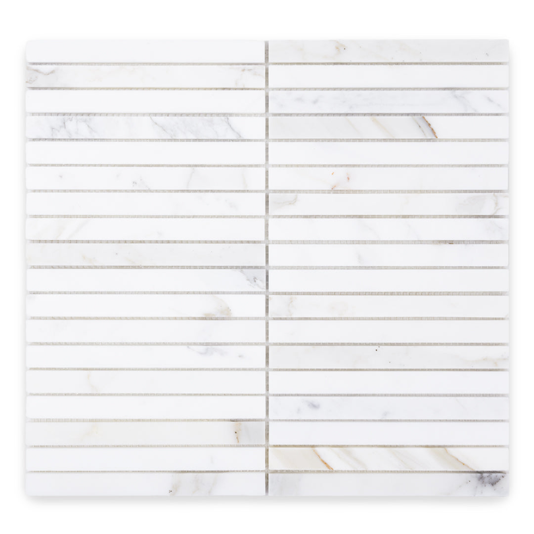 a slim skinny stacked kitkat mosaic of natural marble stone calacatta matte