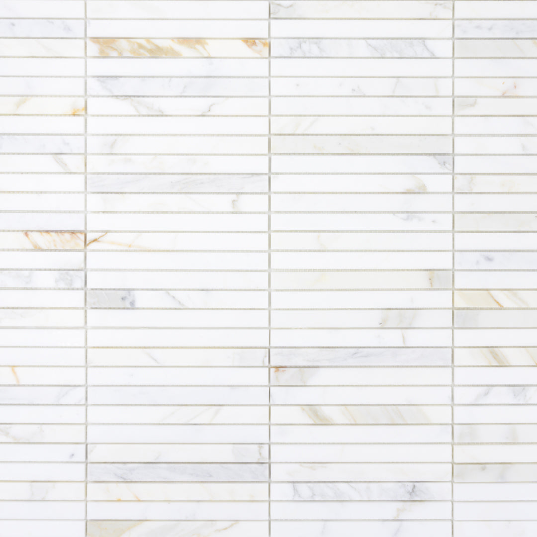 a pencil skinny kitkat mosaic in natural calacatta marble 