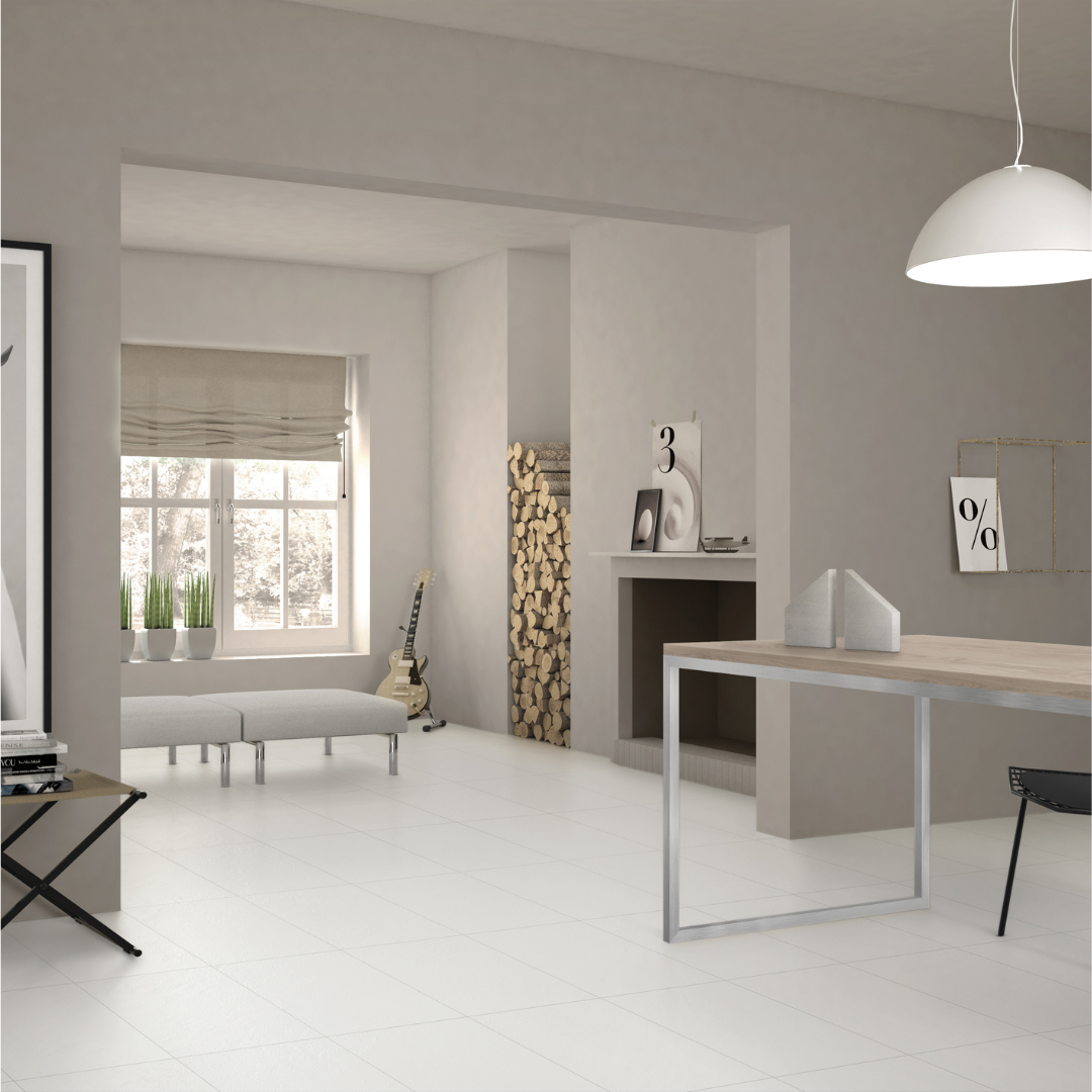 A modern family room featuring grey walls, sleek furniture and white 12x24 tiled floors. 