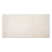Ariel view a of a single 12x24 creamy white avorio marble look tiles with thin veining. 