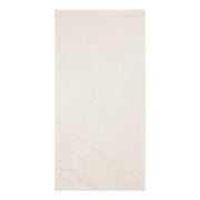 Ariel view of a single 24x48 marble look cream warm white avorio tile with thin gold veining 