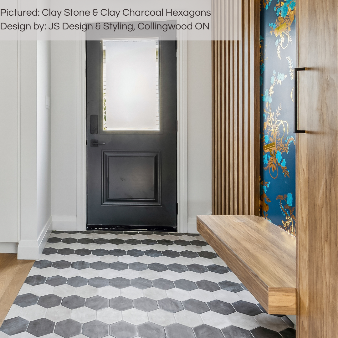 An eclectic entryway with a fun and charming 6" hexagon stripe pattern using clay charcoal and clay stone brick cement look tiles. 