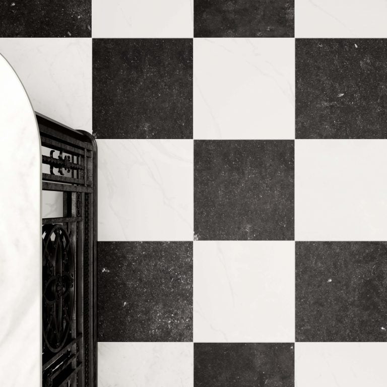 Ariel view of a floor installation using 16x16 black and white matte marble stone looking tiles. 