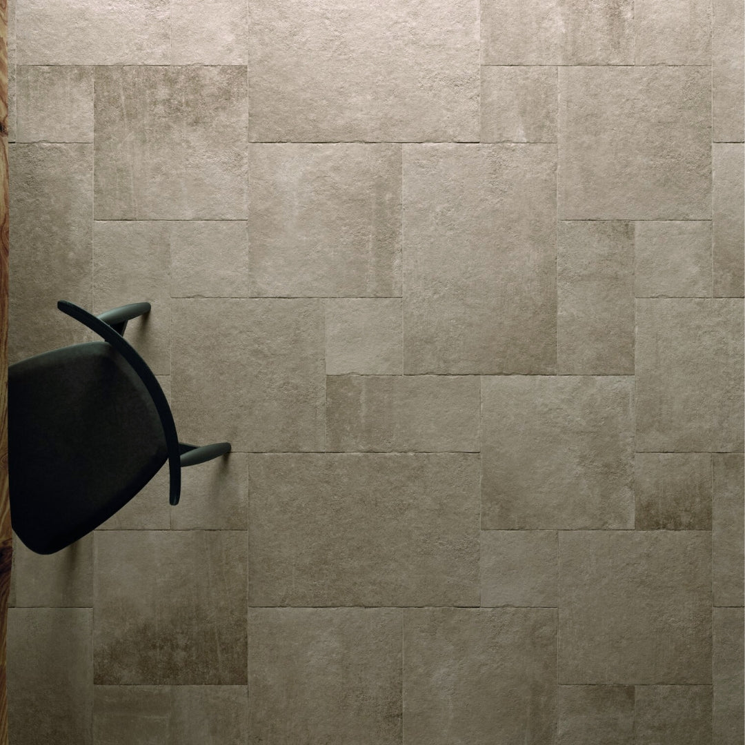 Ariel view of a multiformat porcelain tumbled paver look tile in a cream beige colour. 