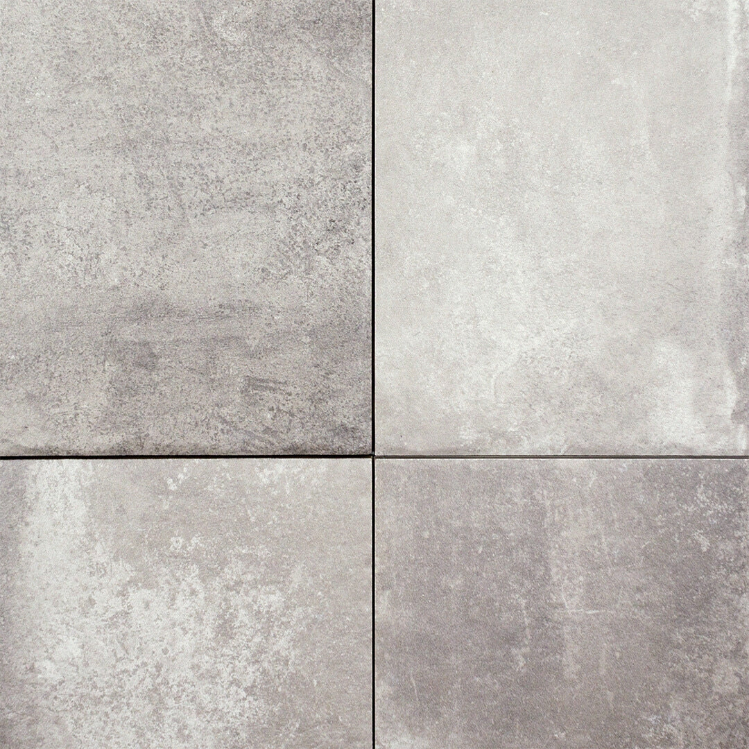 Ariel view of cottage stone gray porcelain paver look multiformat tiles to show the texture, pattern, matte finish and grey colour. 