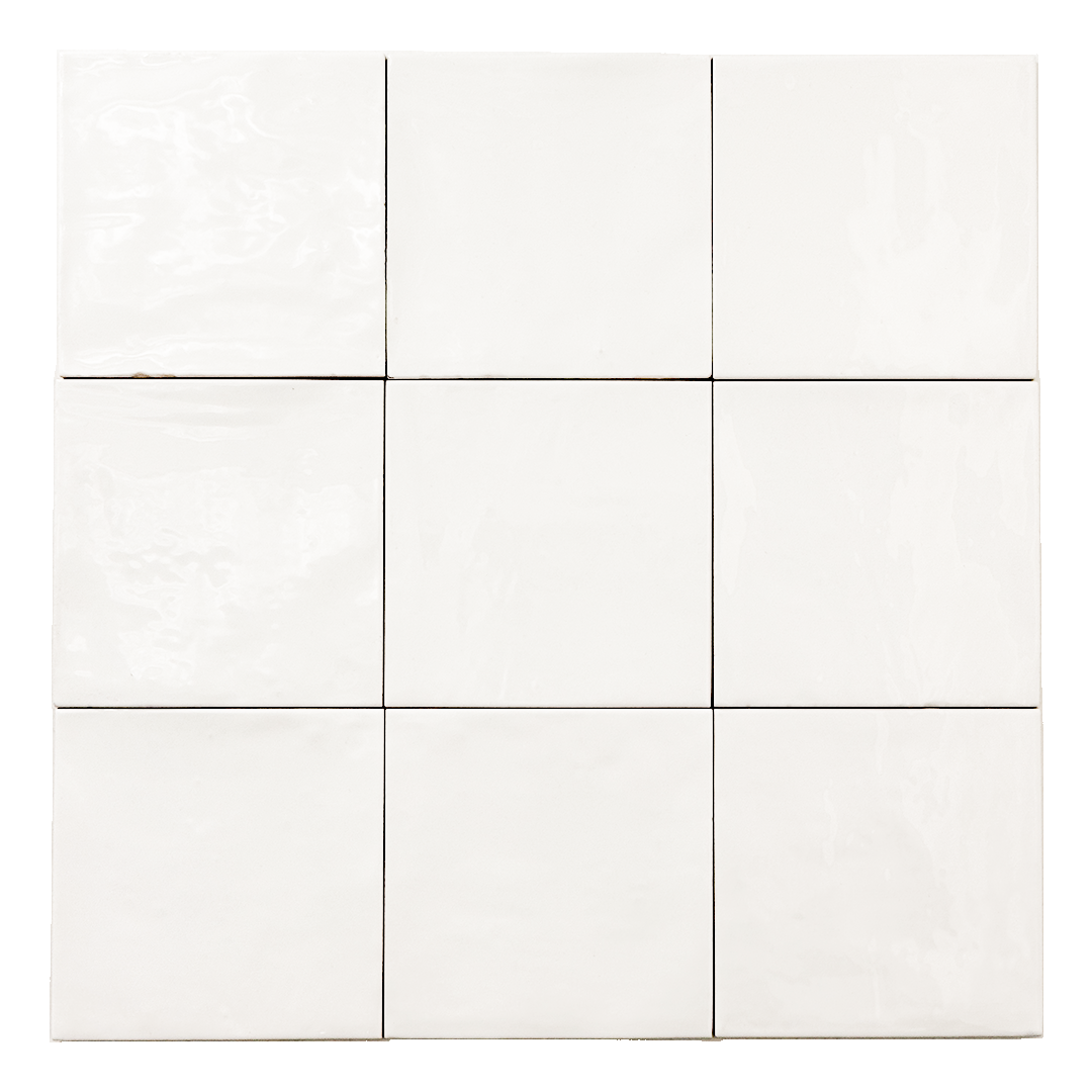 Ariel view of a group of glossy 5x5 textured  powder white tiles showing the textured edges. 