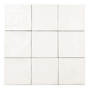 Ariel view of a group of glossy 5x5 textured  powder white tiles showing the textured edges. 