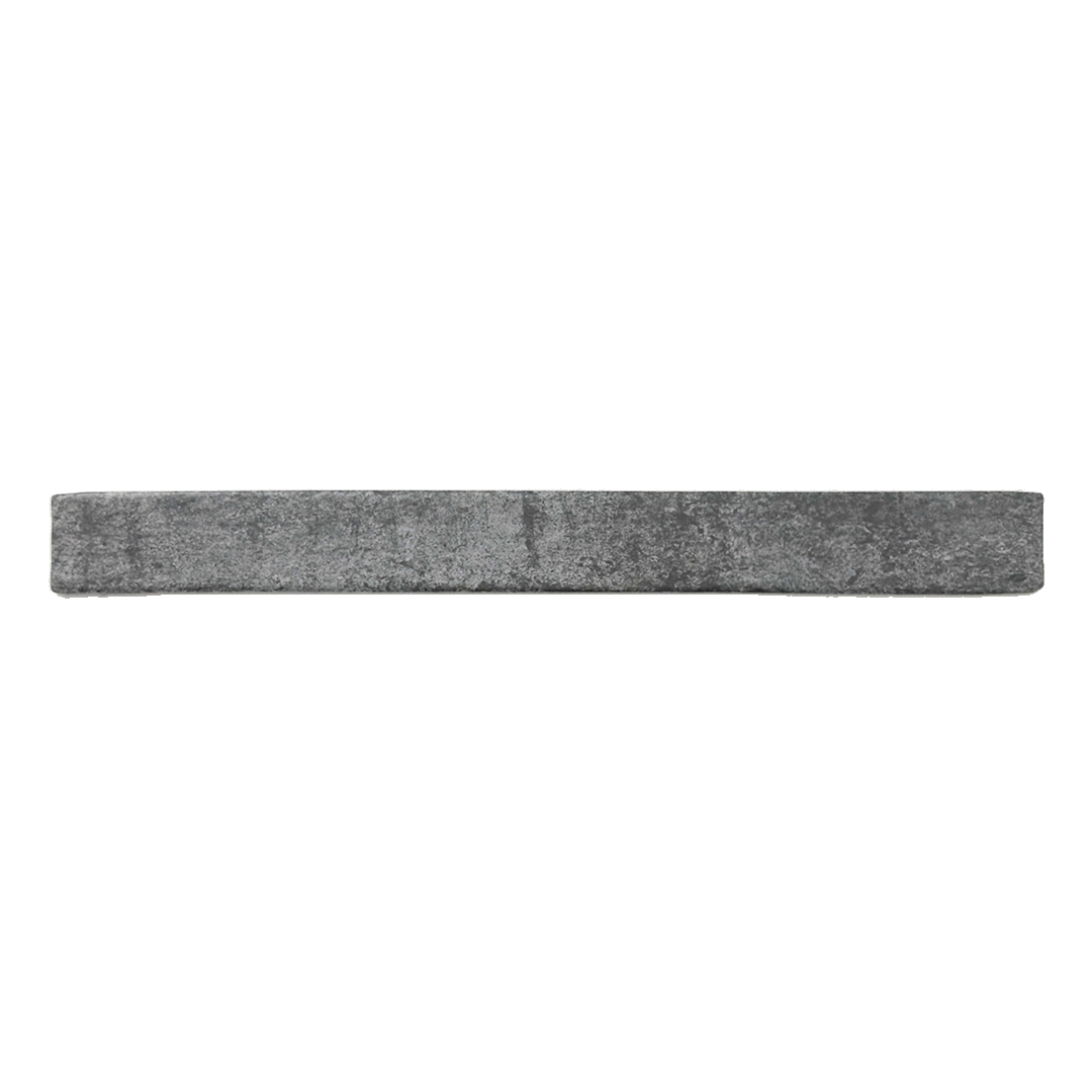 Ariel view of a single charcoal black 2x18 brick look tile. 