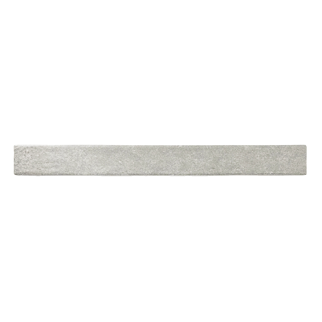 Ariel view of a single grey 2x18 brick look tile. Showing the texture and finish of the tiles.
