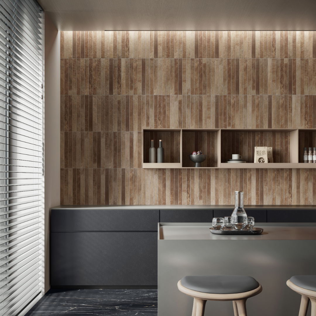 A modern bar area with charcoal and light wood elements. The backsplash of the bar is tiled with terracotta brown 2x18 brick look tiles laid in a modern vertical stack pattern. Showing colour variance, texture and the finish. 