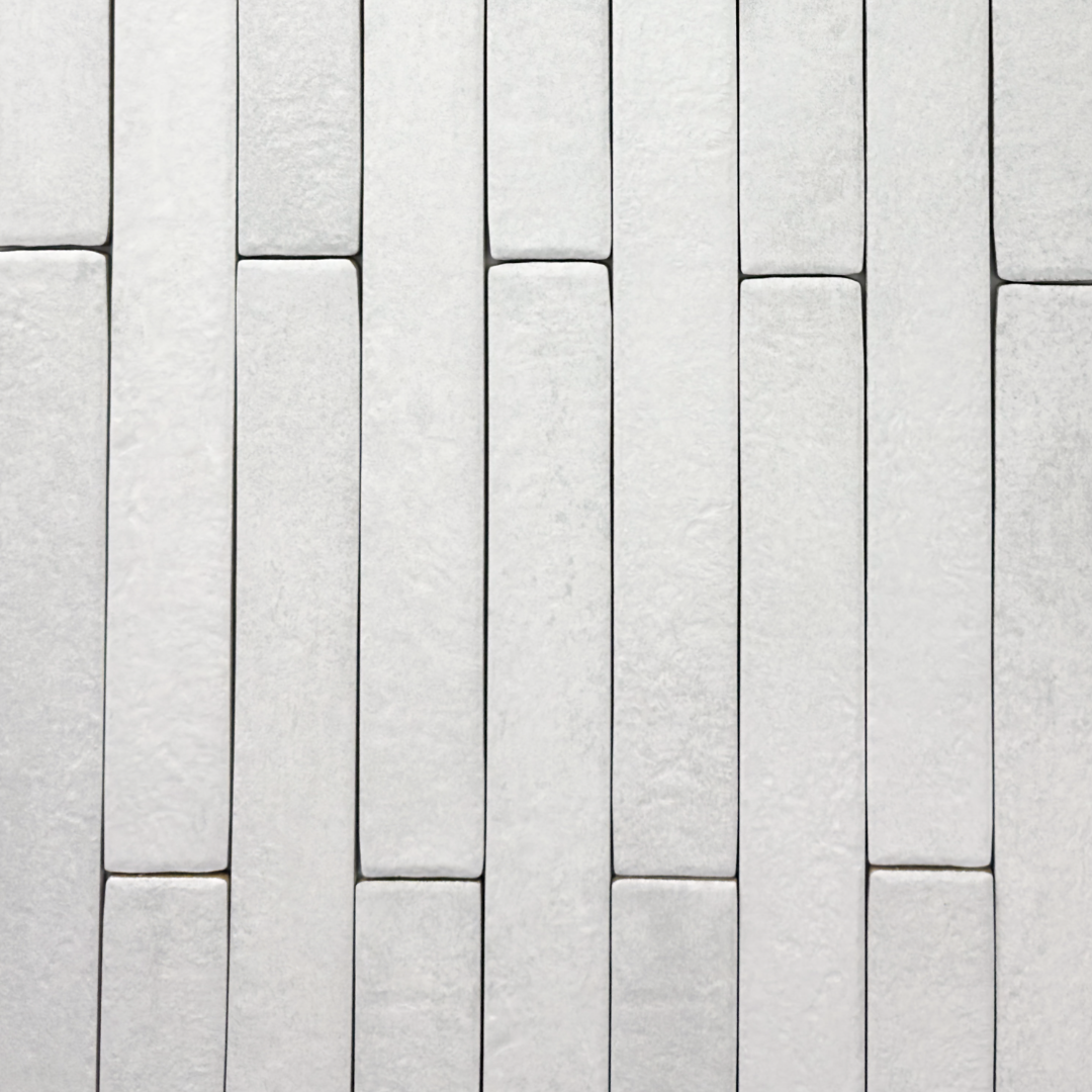 Ariel view of white 2x18 brick look tiles in a vertical brick pattern. Showing the texture and finish of the tiles.
