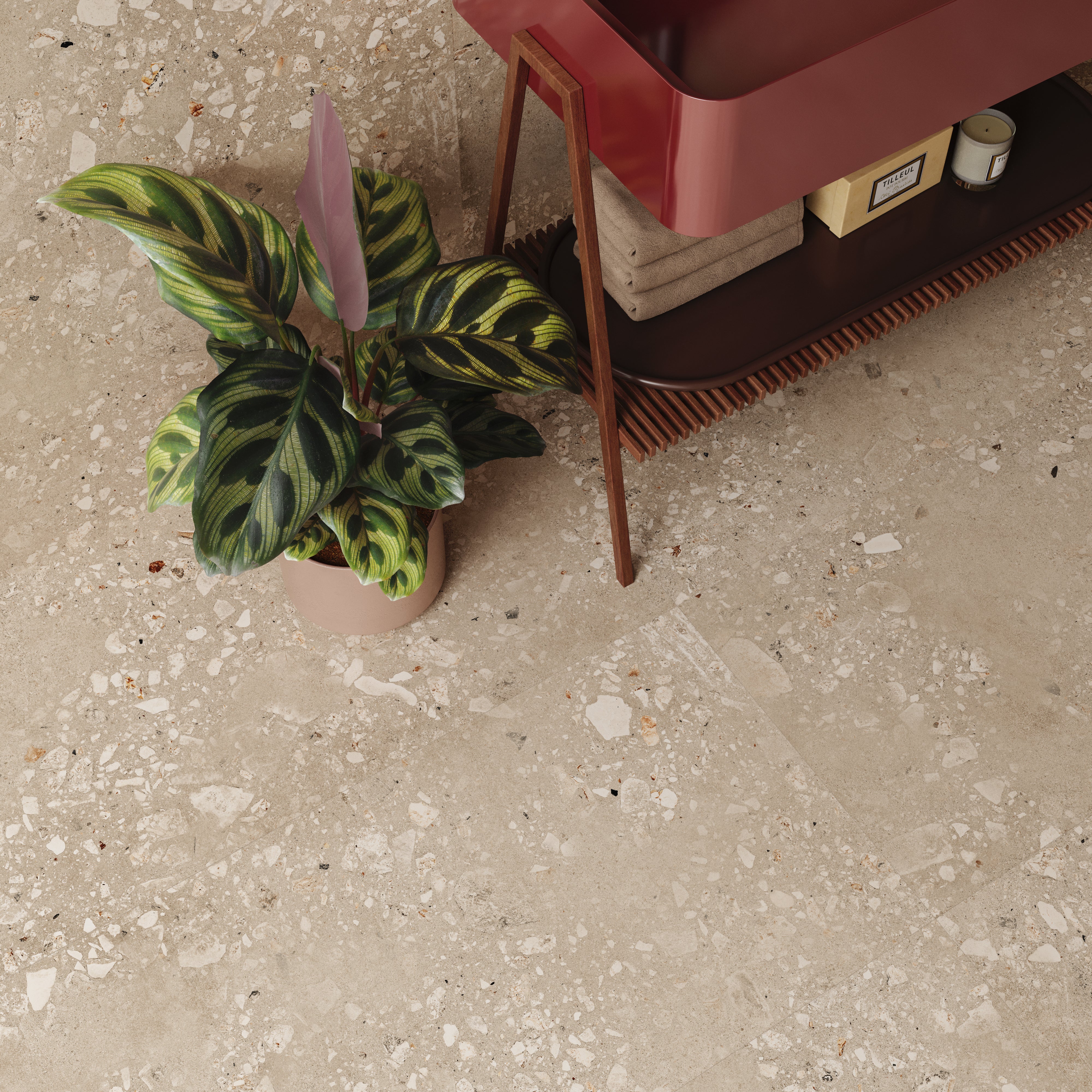 ariel view of a bathroom floor and vanity to highlight the oasis dark beige terrazzo cement look tiles on the floor and backsplash. 