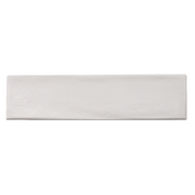A single 3x12 glossy textured white tile.