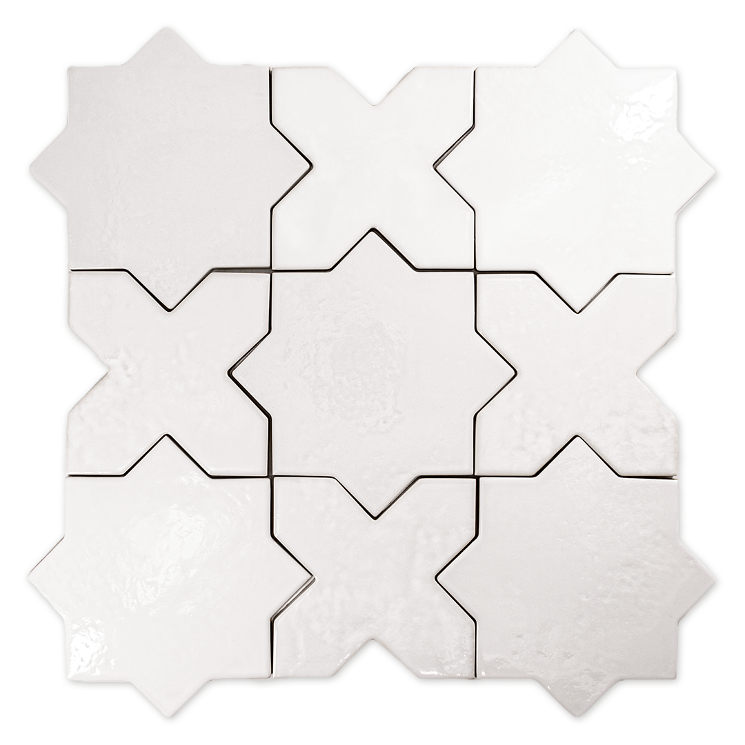 A group of star and cross shaped tiles interlocking together in a glossy white finish