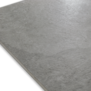 Angled close up of a stone look dark grey tile