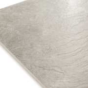 Angled close up of a stone look beige tile