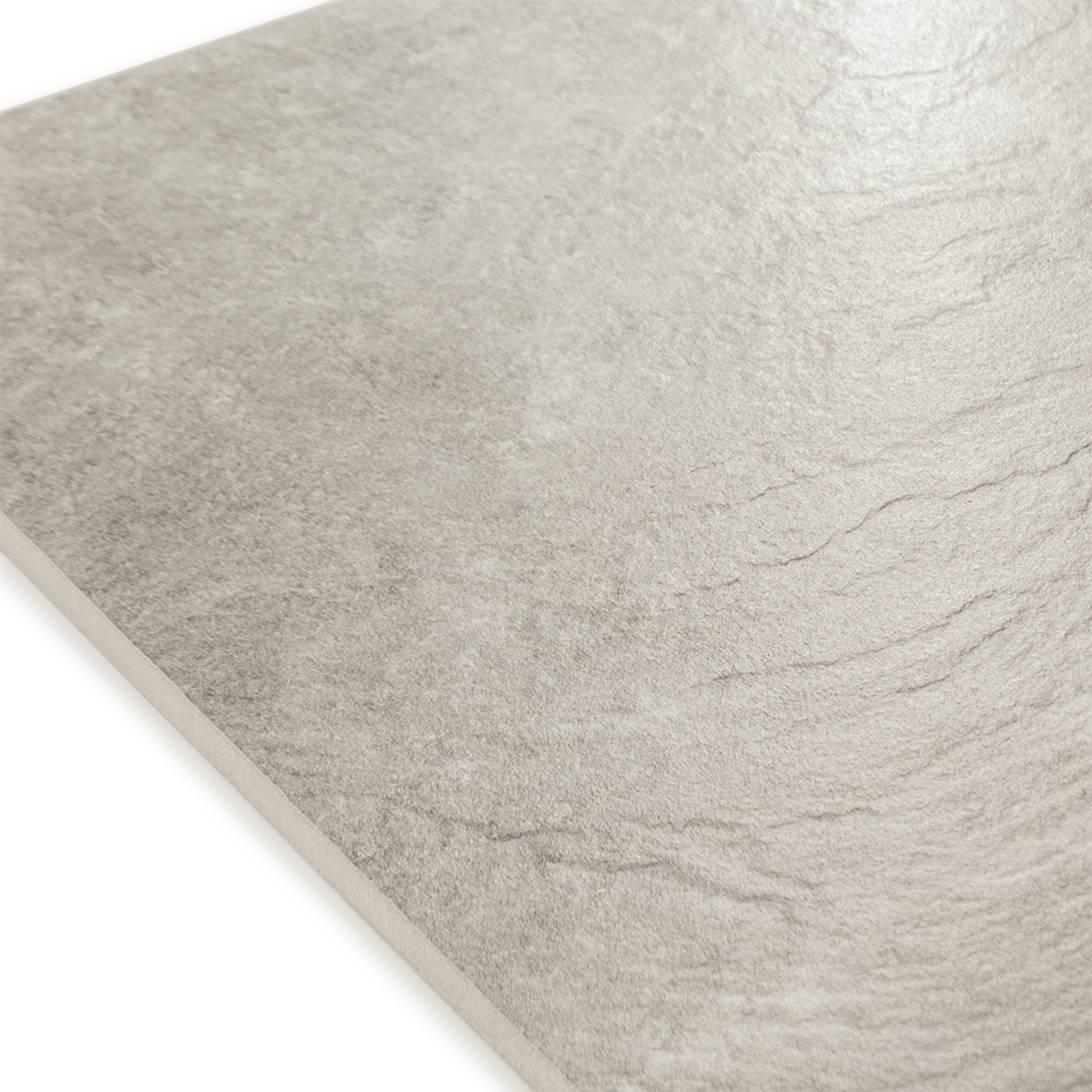 Angled close up of a stone look beige tile
