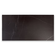 Ariel view of a single 24x48 tile in matte black marble look porcelain with white veining. 