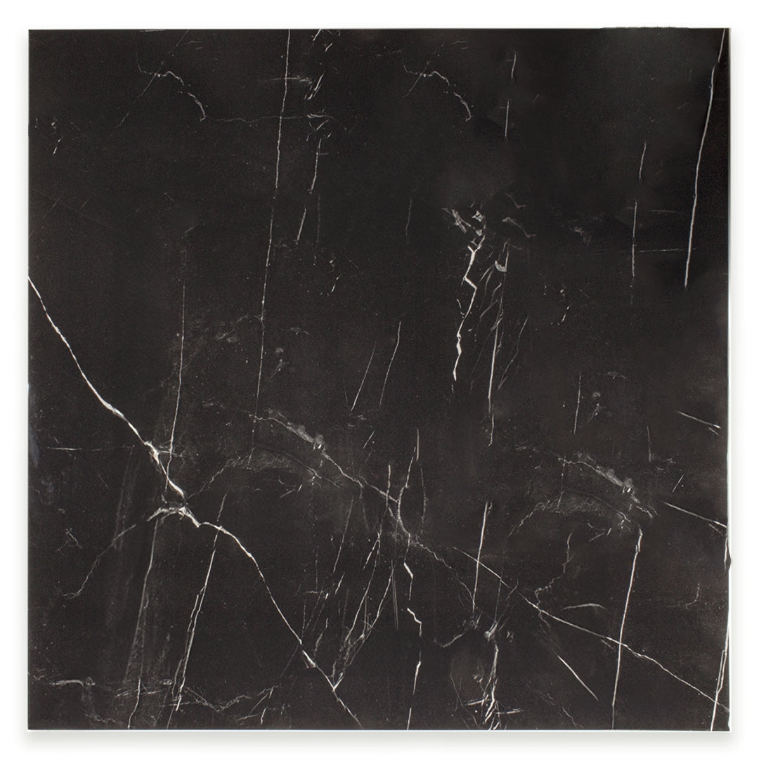 Ariel view of a single 24x24 square tile in polished glossy black marble look porcelain with white veining. 