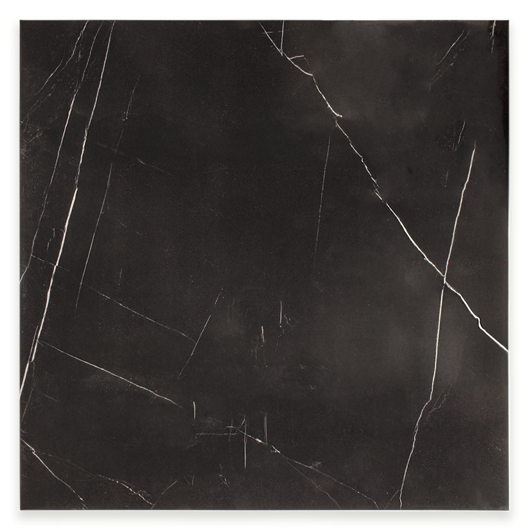 Ariel view of a single 24x24 square tile in polished glossy black marble look porcelain with white veining. The pattern is random. 