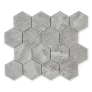 A single sheet of 3" hexagon mosaic tiles in a darker grey stone look.