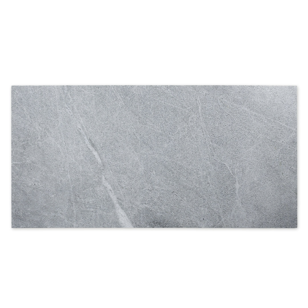 Ariel view of a large blue grey stone look tile with grey and white veining patterns. 