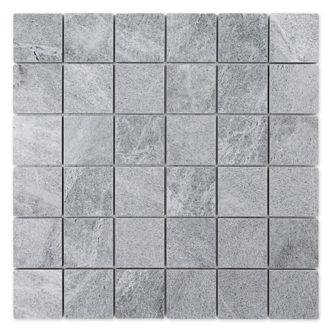 Ariel of a single sheet of a light cement grey 2x2 stone look mosaic tile