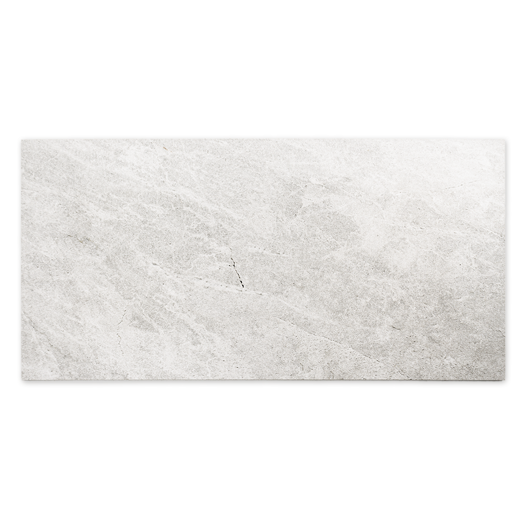 Ariel view of a single 12x24 rectangular white stone look tile. 