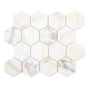 Ariel view of a loose sheet of white and grey and golden veining marble look porcelain 3 inch hexagon mosaic tiles.