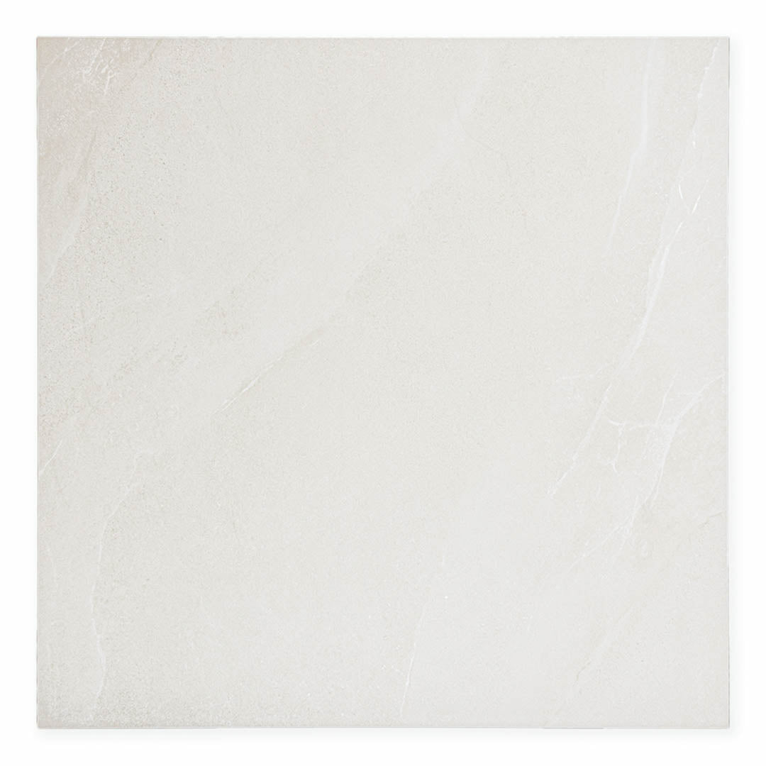 Close up of two tiles edge to edge to highlight the colour and veining of the 24x24 square limestone look light grey tile stonehaven