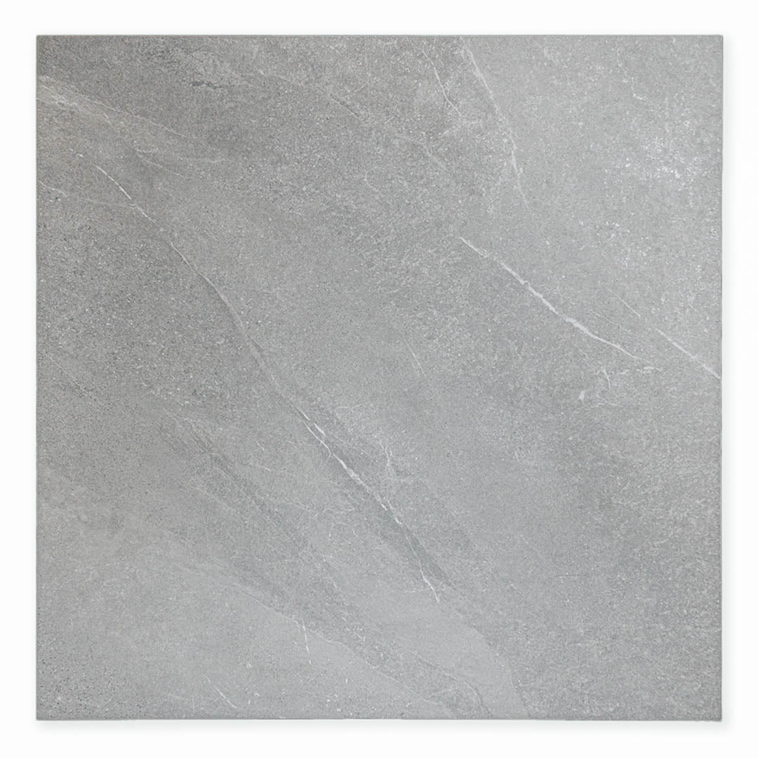 Ariel view of a single 24x24 dark grey limestone look tile with light subtle veining. 