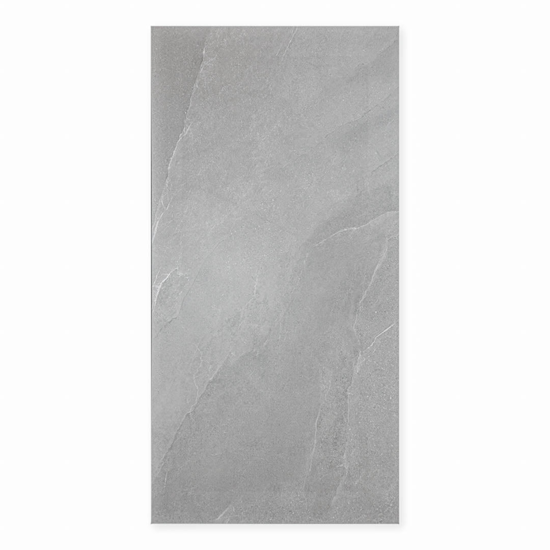 Ariel view of a 24x48 dark grey stone look tile with light thin delicate limestone look veining. 