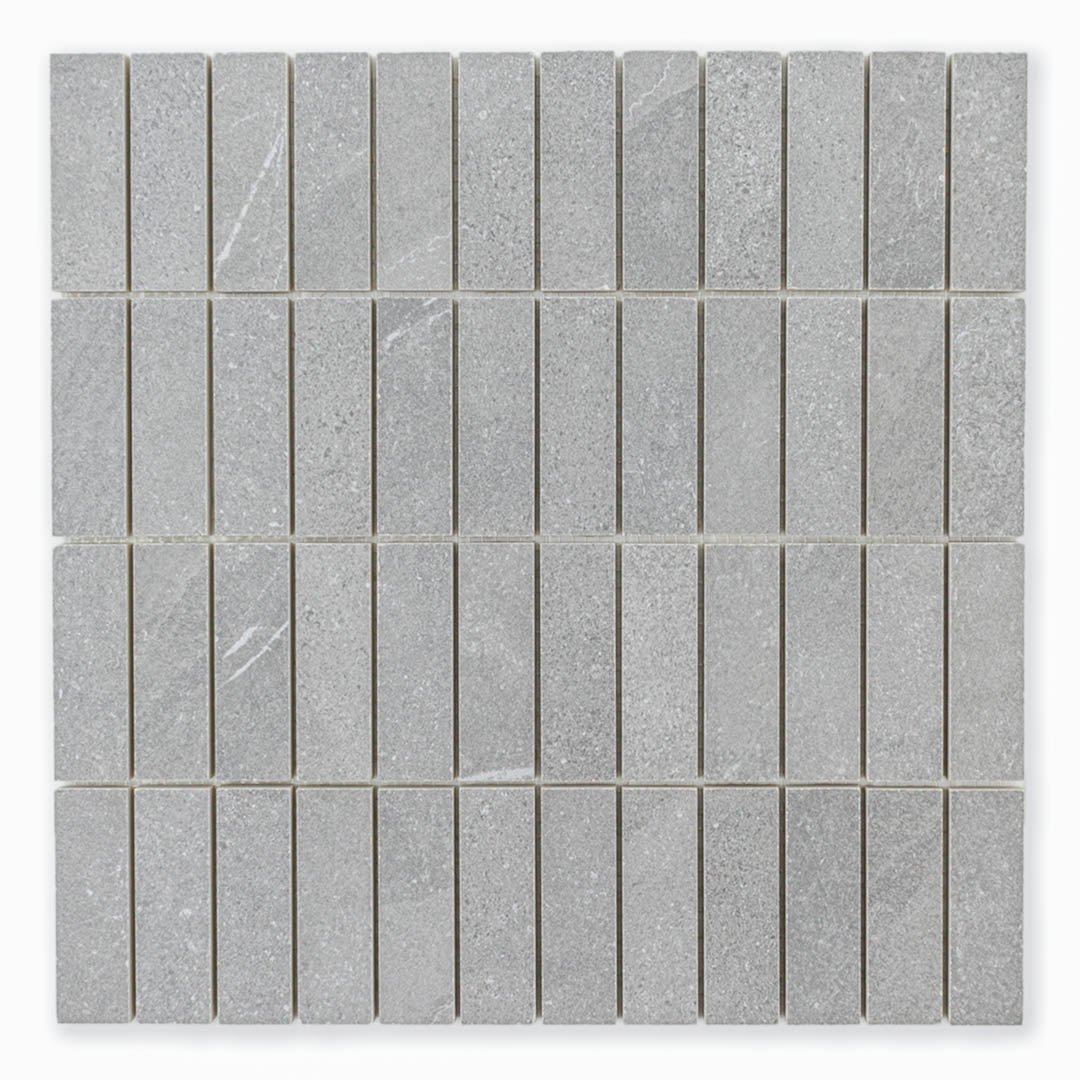 Ariel view of a mosaic dark grey stone look tile in a stacked chip shape 1x3 