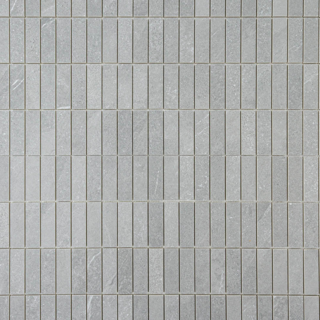 Ariel view of a mosaic dark grey stone look tile in a stacked chip shape 1x3 