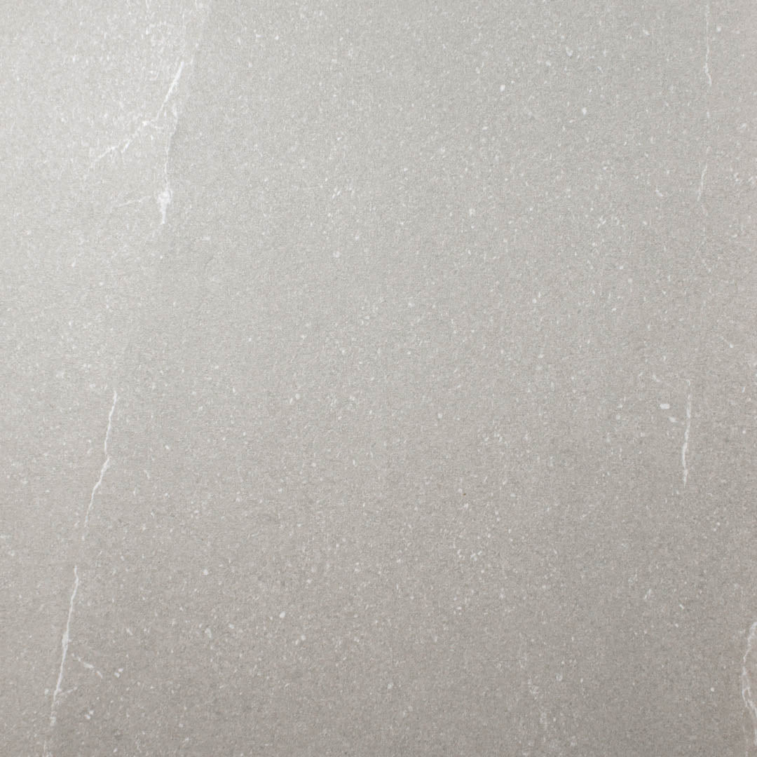 Ariel close up of 24x48 limestone look tiles in taupe to highlight the finish and pattern