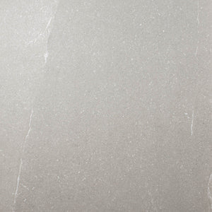 Ariel close up of 24x48 limestone look tiles in taupe to highlight the finish and pattern